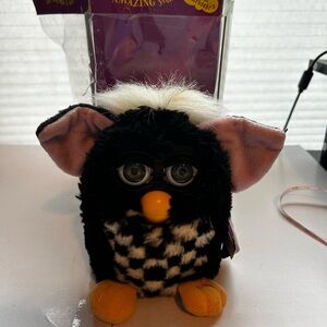 Vintage Furby 1999 by Tiger Electronics is a collectible electronic toy